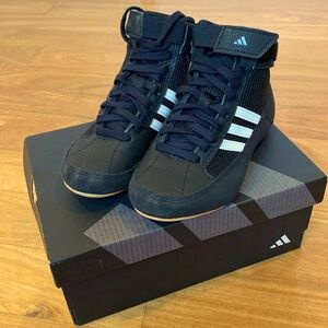 My son tried wrestling but doesn’t like… these shoes have been worn twice